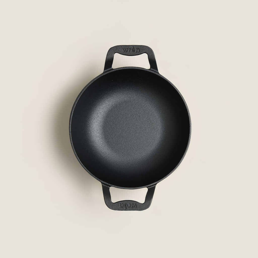 Pre-seasoned cast iron wok Singapore - ready to cook